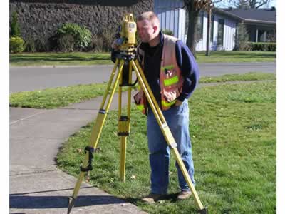 surveyor in the field with transent